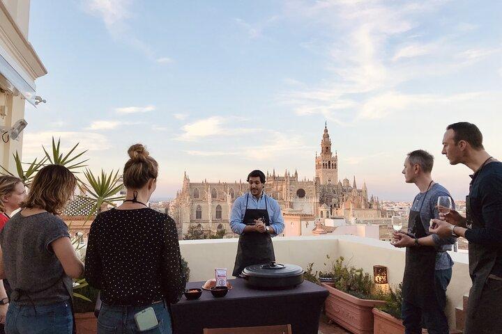 Seville: Small Group Rooftop Paella Class with Sangria Pairing
