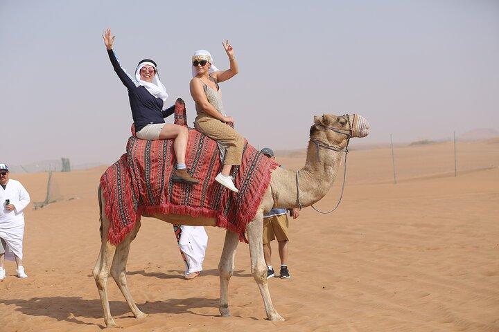Dubai Premium Red Dunes, Quad Bike, Camel Ride, Sand Surfing & 5* BBQ