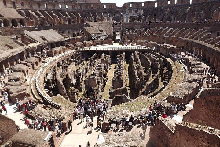 Colosseum, Forum, Palatine Hill with audio guide and Arena or Bus option