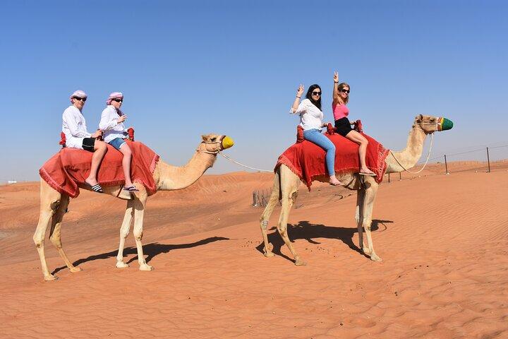 Dubai Red Dunes Camel Safari with Sand boarding, Dune Bashing & BBQ