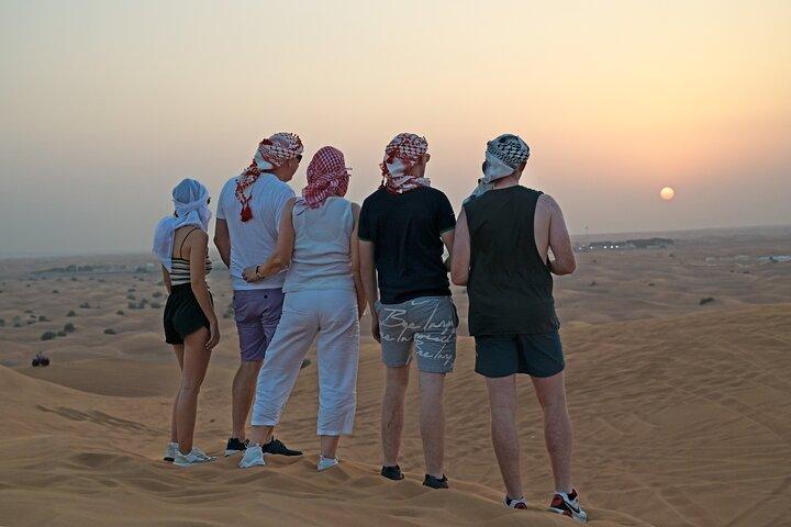 Abu Dhabi Evening Desert Safari with Camel Ride and Dinner
