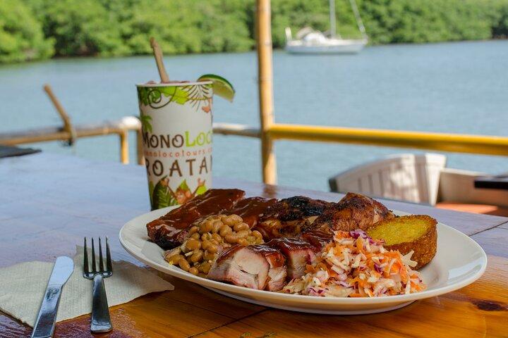 Catamaran Tiki Boat Sunset Snorkeling Dinner Cruise in Roatan
