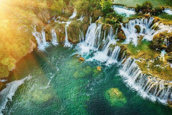 From Split: Krka Waterfalls Trip with Boat Cruise and Swimming