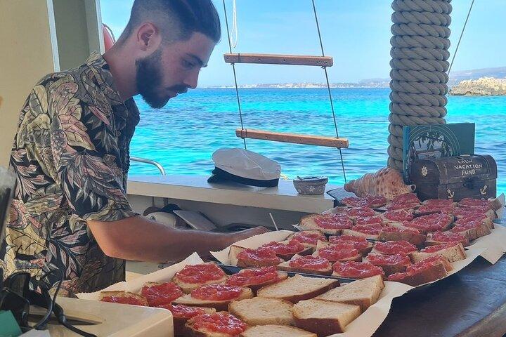 Cruise to White Rocks & Xi Beach with lunch and wine