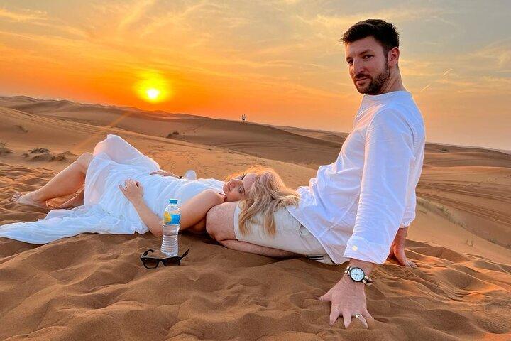 Dubai Dune Bashing with Camel Ride, Sandboarding & BBQ Dinner