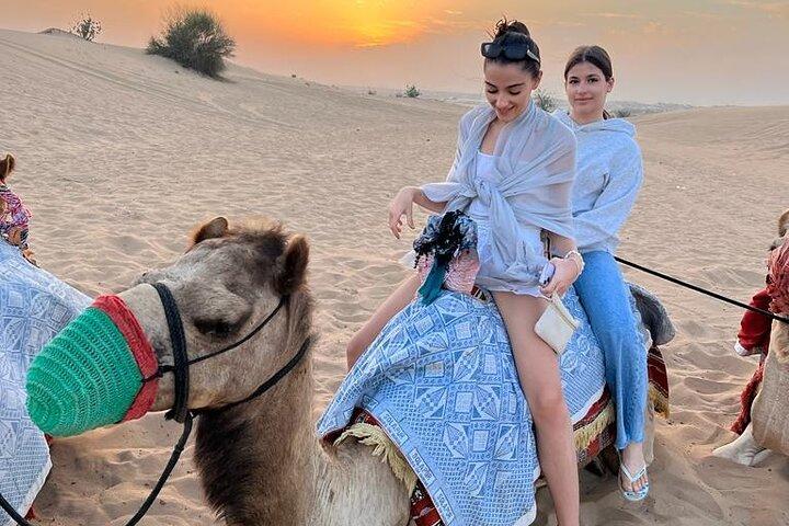 Dubai Dune Bashing with Camel Ride, Sandboarding & BBQ Dinner