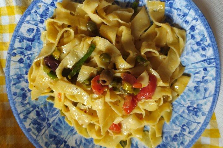 Private and authentic cooking class experience with family