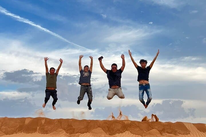 Dubai Evening Desert Safari Dune Bashing Camel Ride & BBQ Dinner