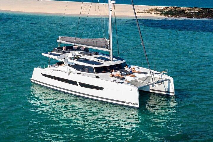 Mykonos: Luxury Catamaran Cruise with Meal, Drinks & Transport