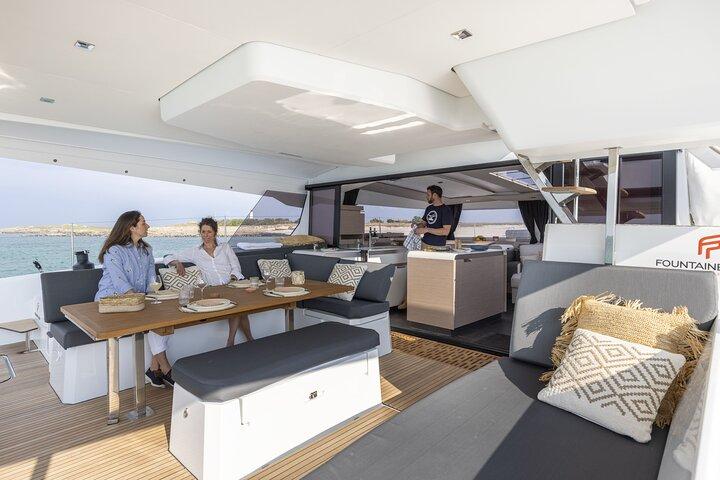Mykonos: Luxury Catamaran Cruise with Meal, Drinks & Transport