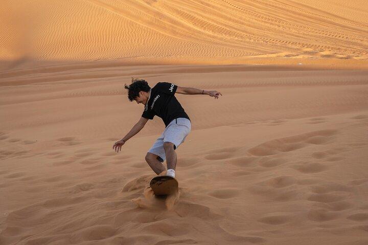 Premium Red Dunes Bashing with Quad Bike, Camel, Falcon &VIP Camp