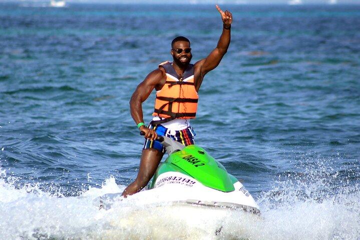 Parasailingcancun and Jet Ski tour over Cancun Bay