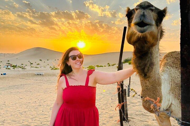 Abu Dhabi Desert Safari with Sandboarding, Camel Ride & Dinner