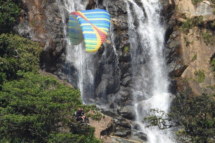 PARAGLIDING over giant waterfalls private tour (optional Guatape) from Medellin