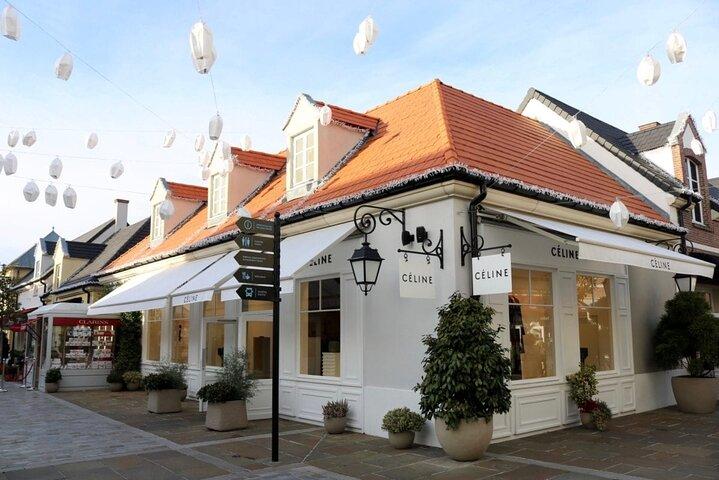Half day private round transfer to La Vallée Village from Paris