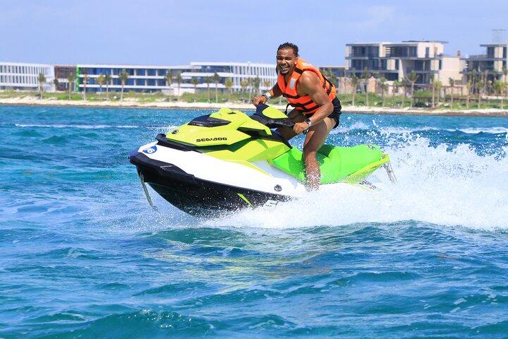 Drive a Waverunner in the beautiful Maroma Beach with transport