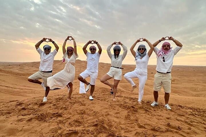Morning Desert Safari - Dune Bashing Camel Ride & Sand Boarding