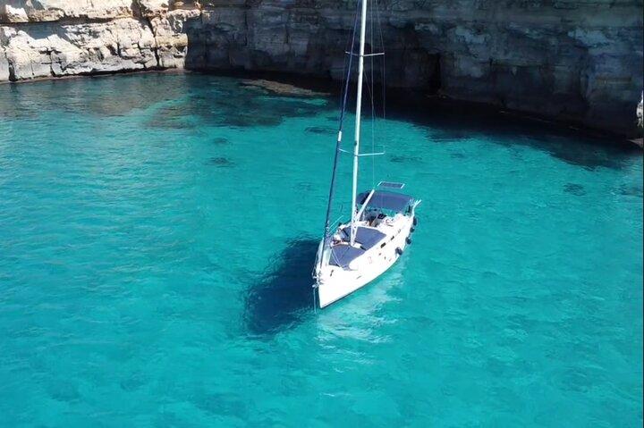 Palm: sailing boat, visit crystall water, tapas, 2 drinks..