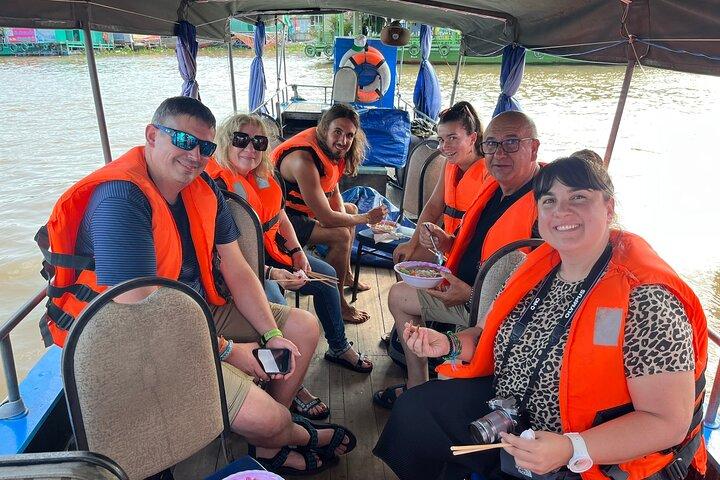 1-Day Cai Rang Floating Market-Biking & Cu Chi Tunnel Trip