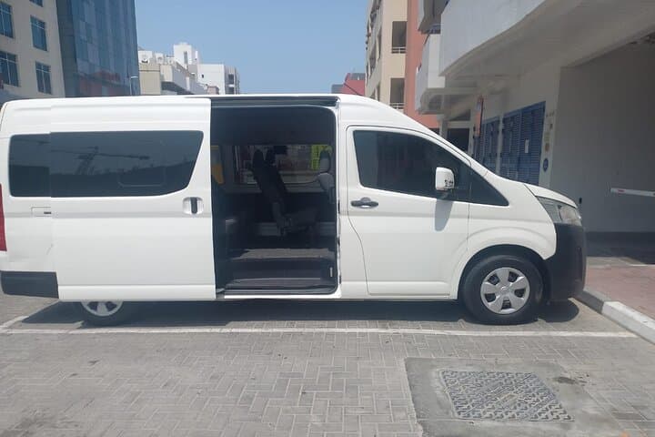 Dubai full day chauffer by 12 seater van