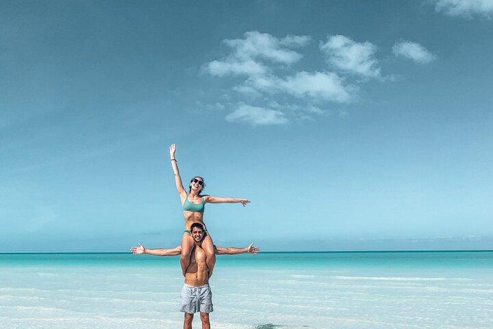 Holbox Island Tour Golf Cart Ferry with Lunch and Transportation