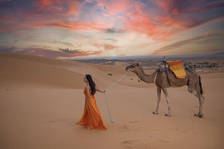 Overnight desert camp experience : camel ride & Sandboarding