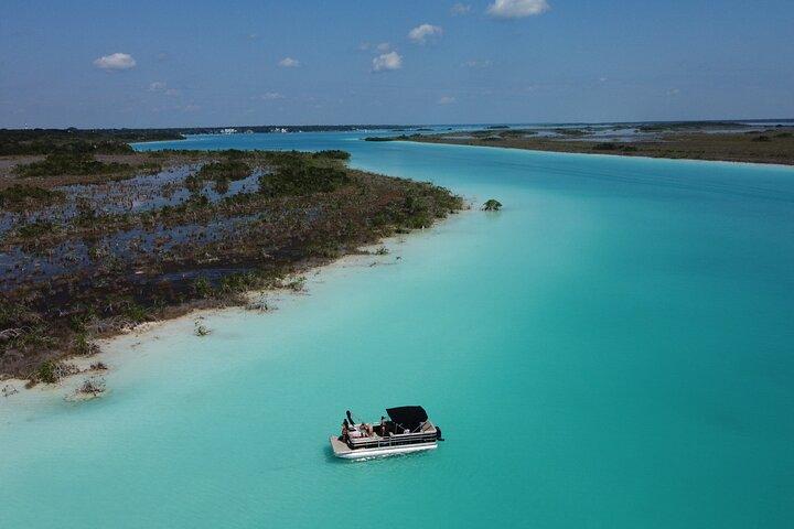 Pontoon Tour - Visit the Pirate Channel, Cenotes and Islands.