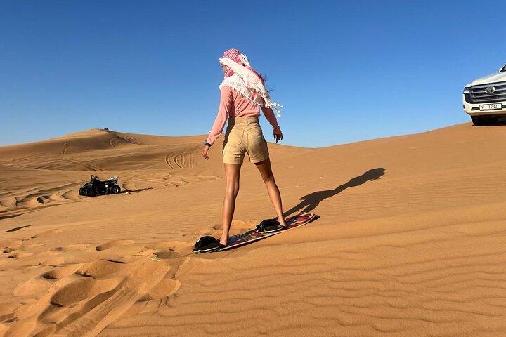 Morning Red Dune Desert Safari Camel Ride and Sandboarding