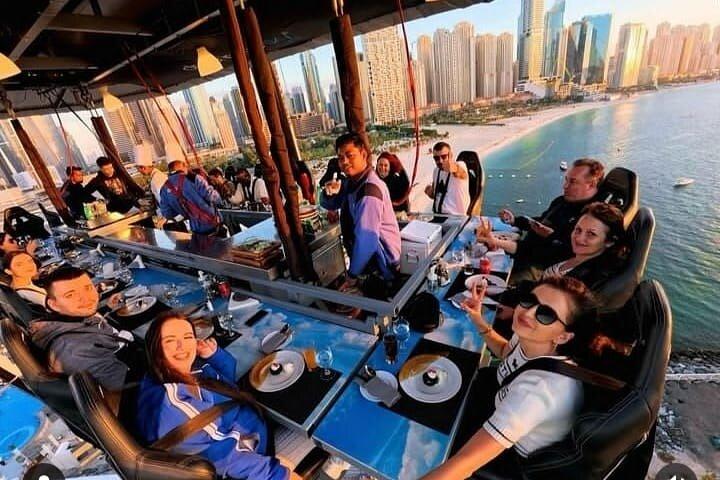 Dubai: Sky Dining Experience with Private Transportation