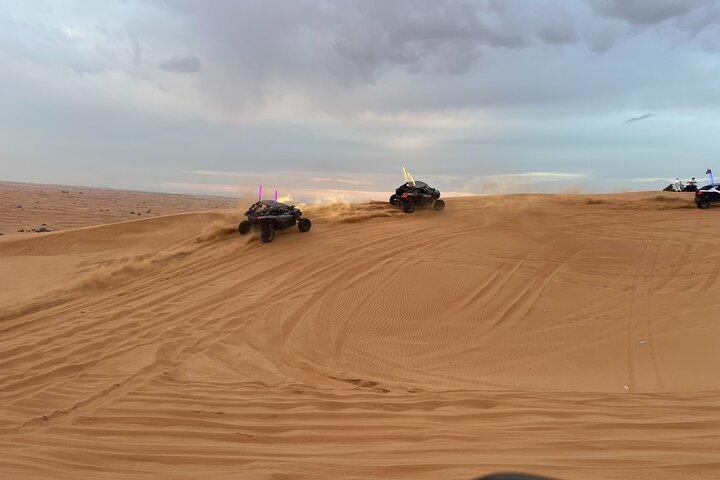 Red Dune Desert Safari Camel Ride, Sandboarding with BBQ Dinner