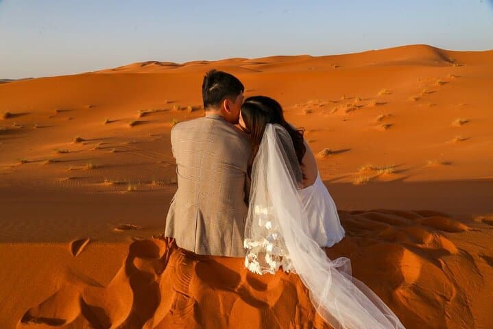 Overnight desert camp experience : camel ride & Sandboarding