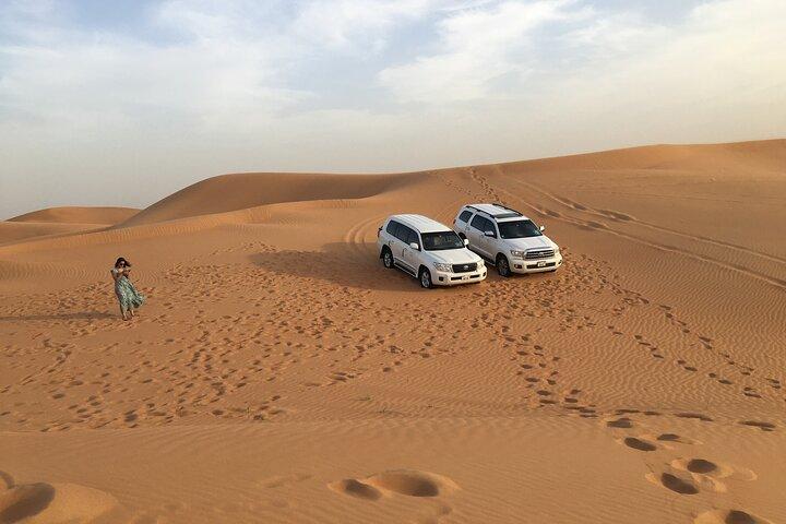 Premium Camp Red Dune Desert Safari Camel Ride and Sandboarding