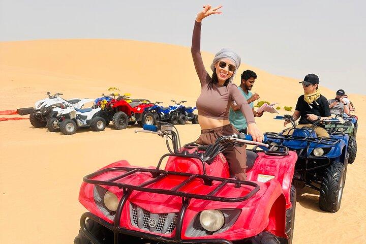 Abu Dhabi Morning Desert Safari with Camel Ride & Sandboarding