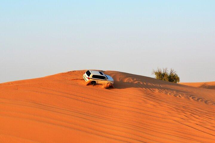 Dubai Evening Desert Safari with RedDune, sandboarding, live show
