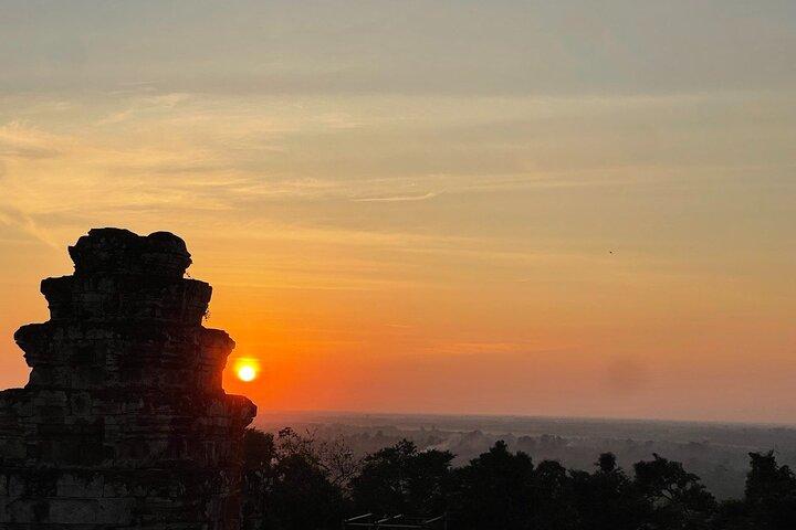 Exploring the Ancient Wonders of Angkor Wat with sunset backheng