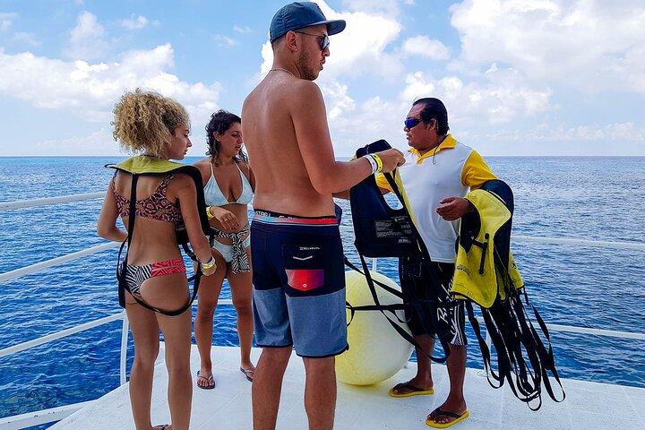 Tour to Cozumel by Catamaran with Snorkeling and Lunch included