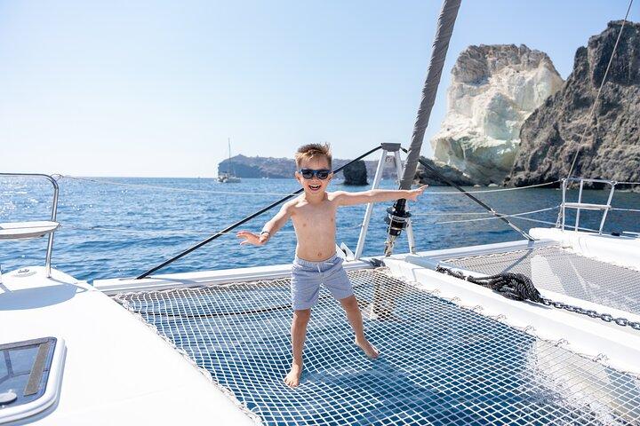 Santorini Gold Catamaran Cruise with BBQ, Drinks and Hotel Pickup