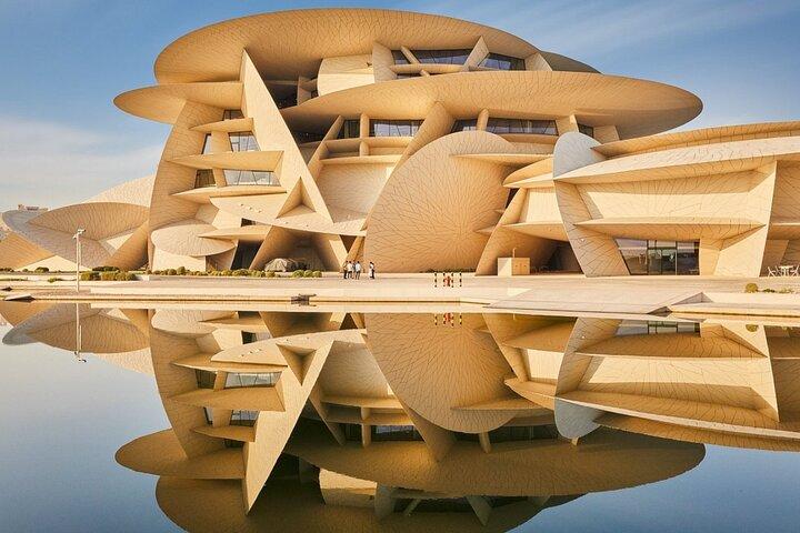 City Tour and Desert Safari with Camel Ride and Sand Boarding