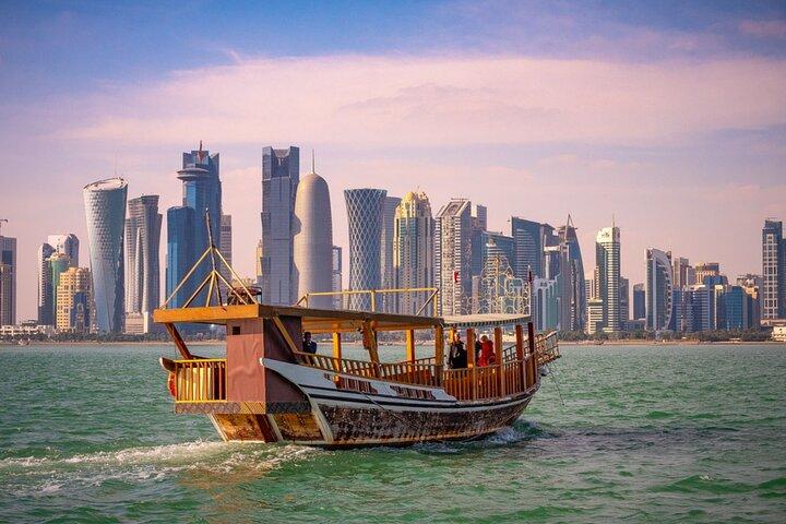 City Tour and Desert Safari with Camel Ride and Sand Boarding