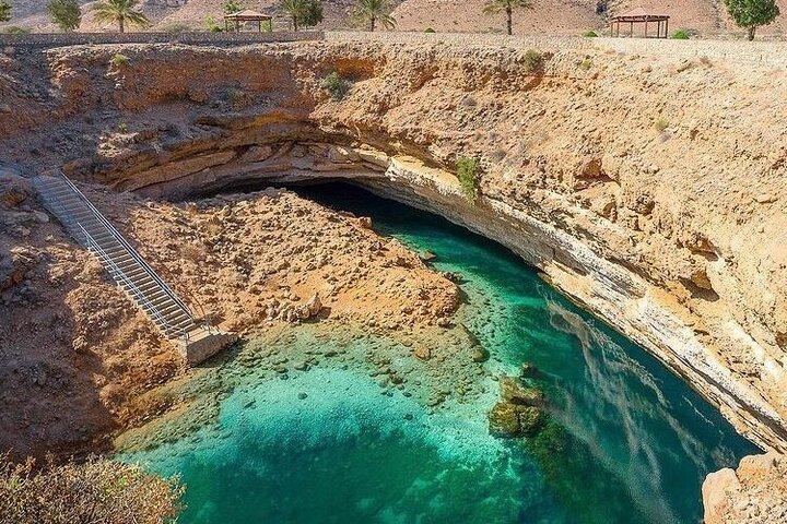 Full Day Group Tour to Wadi Shab Bimmah Sinkhole and Fins Beach