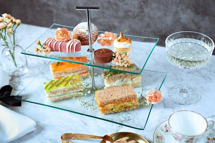 London Afternoon Tea Experience Aboard a Glass-Roofed Bus