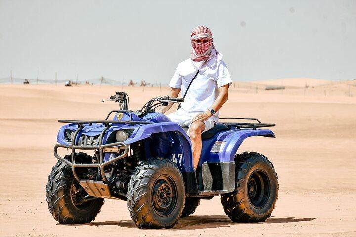 Desert Safari With BBQ Dinner, Quad Bike & Camel Ride from Dubai