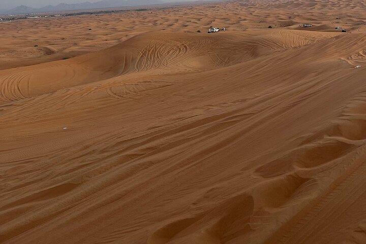 Desert Safari with 30 minutes Buggy Ride with Camel Ride & Dinner