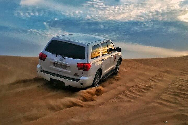 Sunset Desert Safari Dubai with Camel Ride and Sandboarding