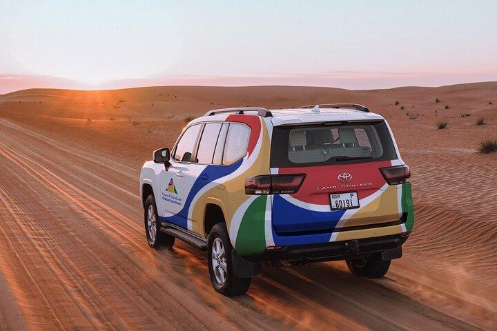 Dubai Desert Safari: Camel Ride, Sandboarding, BBQ & House Drinks