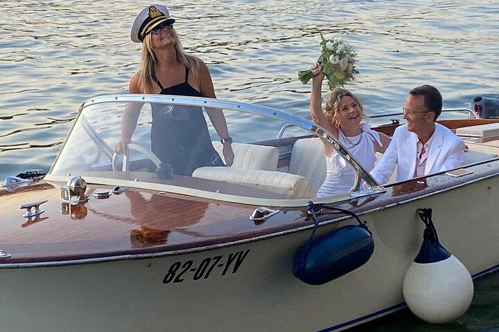 Private Cruise In Paris aboard a Riva-style boat