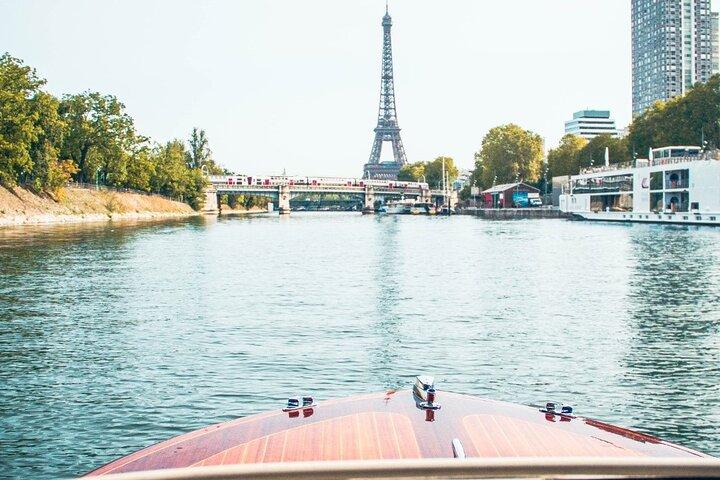 Private Cruise In Paris aboard a Riva-style boat