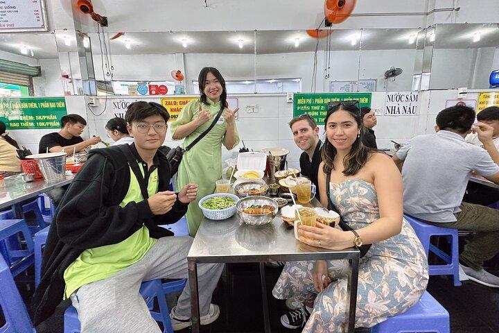 Morning Saigon Unseen+Street Food Tour with Ao Dai Riders Option