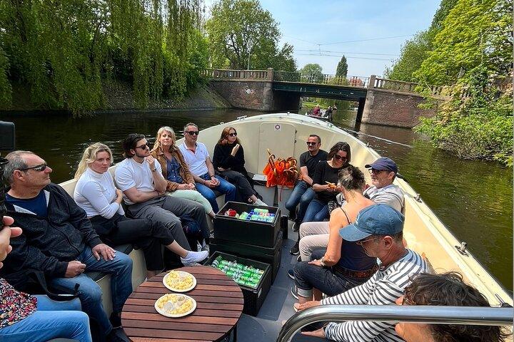 Explore Amsterdam by Bike in the Company of a French Local Guide