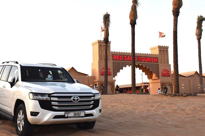Experience the Desert Safari BBQ, Dinner Camel Ride Sandboarding